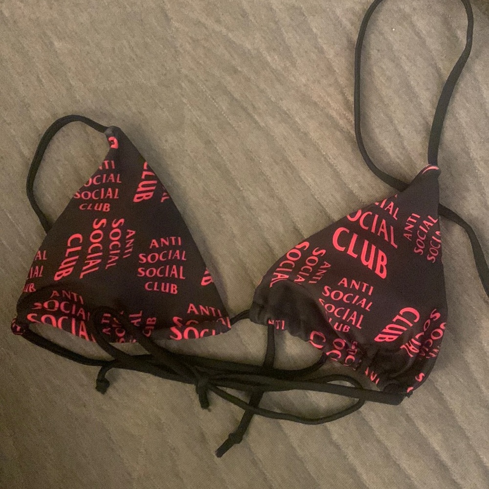 A size small antisocialsocialclub black and red bathing suit.